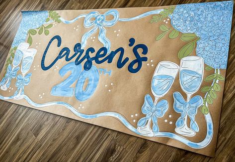 Blues and hydrangeas for this cute banner🩵🫶🏼 • • • @thewavypaintbrush design. Do not replicate. #banner #banners #hydrangeas #brownpaperbanner Blue 21st Birthday Ideas, 21st Birthday Banner Painted, 20th Birthday Banner, Hand Painted Birthday Banner, Craft Paper Banner, Cute Birthday Decorations, Blue Birthday Decorations, Birthday Banner Ideas, Blue Party Themes