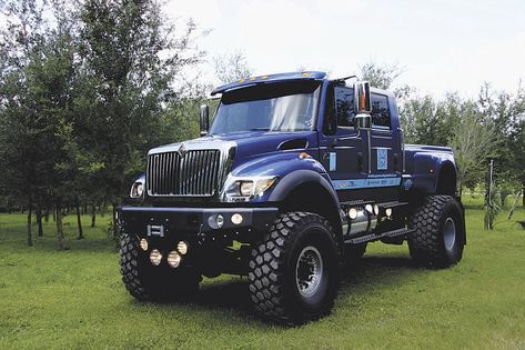 The world’s largest street legal 4-WD pickup was recently unveiled in Denver, Colo. The modified International CXT has pickup styling with monster truck impact. https://www.farmshow.com/a_article.php?submit_search=1&keywords1=CXT&aid=24566&aid_previous=25266&page_num=1&nav_previous=&nav_next=1 Mod Cars, 6x6 Truck, Мотоциклы Cafe Racers, Dually Trucks, Dream Trucks, Medium Duty Trucks, Truck Mods, Custom Pickup Trucks, Jacked Up Trucks