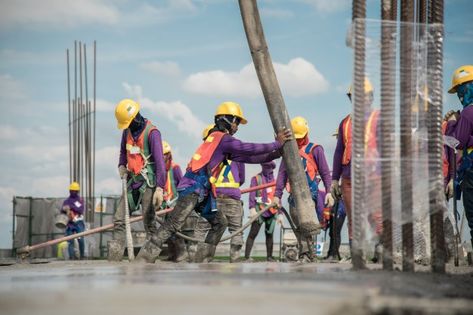 Construction worker pouring concrete | Premium Photo #Freepik #photo #people #building #man #road Construction Garage, Brick Repair, Clothes Words, Industrial Hall, Pipeline Construction, Workers Compensation Insurance, Workers Compensation, Hvac Technician, Mix Concrete