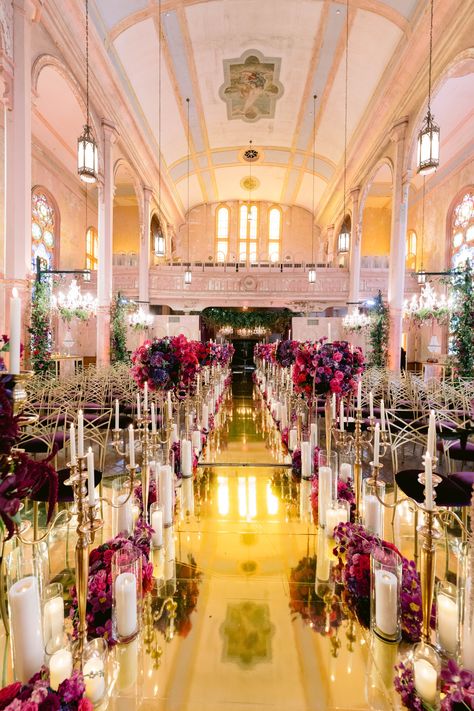 Witness the magic of Natalee and Jeff's long-awaited wedding, where every detail sparkled with elegance and sophistication, thanks to Blue Gardenia Events! ✨ Hotel Peter & Paul served as the perfect backdrop, transformed into a vision of grandeur adorned with gold, crystal, and cascading blooms in rich hues.