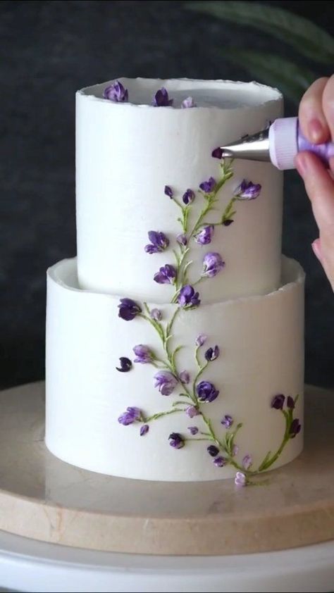 Piped Cakes Designs Simple, Cake With Vines And Flowers, Piping Top Of Cake, Cute 2 Tier Cakes, Buttercream Wildflower Cake, Purple Cake Designs Birthday 2 Tier, Cream Flowers Cake, Wild Flower Cake Wedding, Flower Cake 2 Tier