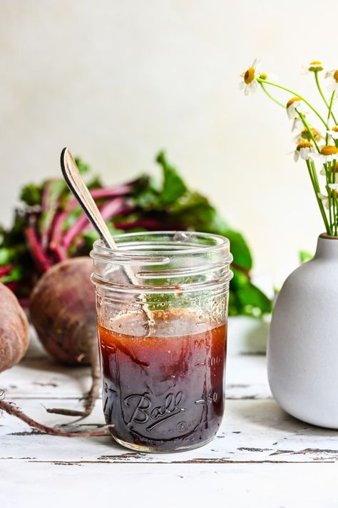 This Easy Beet Vinaigrette is a 5-minute recipe that combines the earthiness of beets with the tang of balsamic, and a hint of sweetness from maple syrup. It's a light and fresh dressing that's perfect on any green salad. Beet Salad Dressing Vinaigrette, Beet Vinaigrette Dressing, Beet Salad Dressing, Beet Vinaigrette, Vegetable Marinade, Simple Spinach Salad, Raw Beets, Balsamic Vinaigrette Dressing, Simple Green Salad