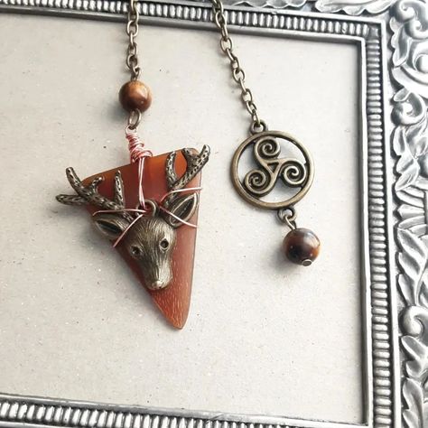 Adding some pendulums New designs that I have finished, going on the site soon. Do you know that we have close to 100 pendulums available? All handmade and one of a kind. How To Use A Pendulum, Using A Pendulum, Working With Pendulums, Handmade Pendulum, Foucault Pendulum, Design