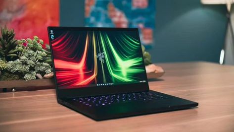 Razer Blade 14 Review: A Compact Gaming Powerhouse . Are you looking for a premium gaming laptop that can handle any game and fit in any bag? If so, you might want to check out the Razer Blade 14, one of the most popular gaming laptops in the market. In this review, we will tell you everything you need to know about this laptop, including its design, performance, battery life, and how it compares to its competitors. . Continue reading at....... https://promojoyz.com/razer-blade-14-review-a-c... Red Lantern Razer, Razer Keyboard, Razer Laptop, Razer Blackshark V2, Razer Huntsman Mini Keyboard, Razer Blade, Best Gaming Laptop, Hardware Components, Video Game Genre