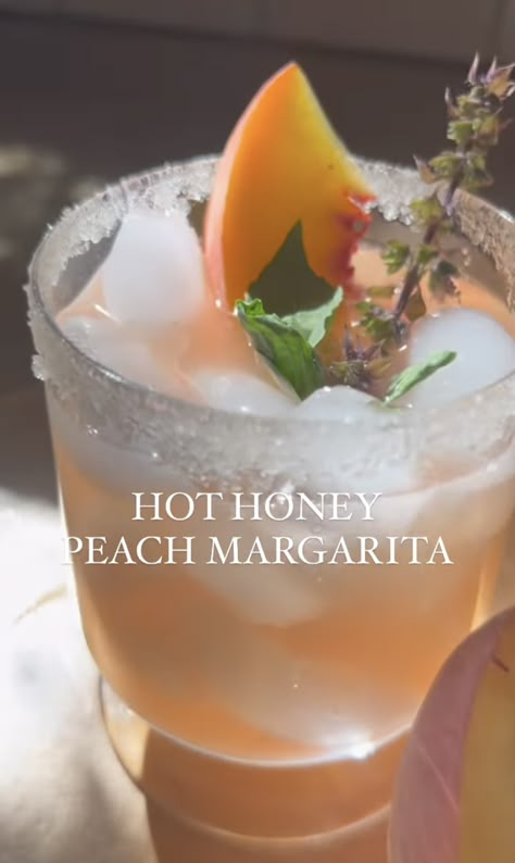 Hot Honey Peach Margarita🍸🍑 This 👏🏼 Recipe 👏🏼 is here juuuuust in time for the start of peach season. Here’s the thing- I’ve had some really good peach Margaritas in the past. But I’ve always wanted a bit of an extra kick, you know? So when I was developing this recipe, I decided to play […] Pretty Cocktail, Margarita Board, Hot Honey Cocktail, Drink Ideas For Party, Honey Cocktails, Unique Margaritas, Peach Margarita Recipe, Honey Margarita, Hot Honey Margarita