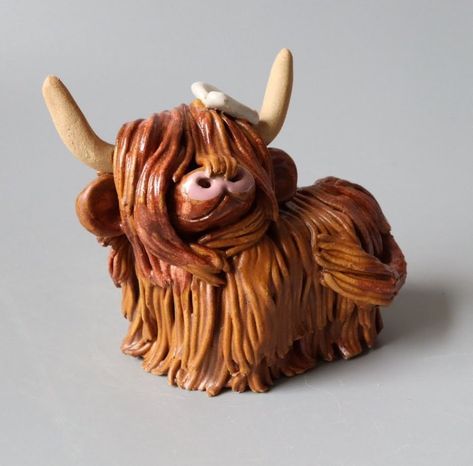 Cow Pottery Ideas, Highland Cow Sculpture, Air Dry Clay Highland Cow, Highland Cow Pottery, Polymer Clay Highland Cow, Highland Cow Clay Sculpture, Ceramic Cow Sculpture, Highland Cow Clay, Ceramic Highland Cow