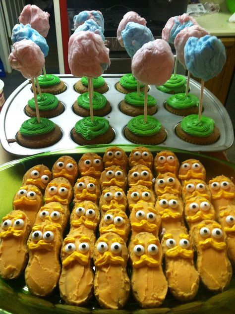 Truffela tree cupcakes made with cotton candy and lorax made of nutterbutter cookies #drseuss #lorax #truffelatrees #cupcakes #cookies #aljdesigns Lorax Desserts, Nutterbutter Cookies, Lorax Cookies, Lorax Halloween, Recipe For Strawberry Jam, Dr Seuss Food, Lorax Birthday Party, Snacks For Children, Lorax Birthday