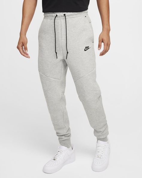 These classic Tech Fleece Joggers offer polished warmth and comfort made with our premium, low-bulk fleece. Tall cuffs let you show off your kicks. Shown: Dark Grey Heather/Black Style: HV0959-063 Grey Tech Fleece, Nike Tech Pants, Nike Tech Fleece Joggers, Tech Pants, Nike Tech Fleece, Nike Tech, Formal Shirts For Men, Tech Fleece, Chino Trousers