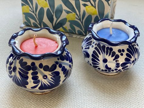 "Our talavera candles are handmade and hand painted by the best artisans in Puebla, México. Our talavera candles come in 3 different sizes and colors Sizes: Small( 2 x2 inches) Medium 4\"x 4\"inches Small blue and white curved top (21/2\"x 21/2\") Colors: (we can paint any color) White, Blue and white White and blue Gray and white Black Pink our three signature scents: vainilla, lavanda, and apple-cinnamon) Our talavera candles are perfect for any room they can be turned to a decorative element Mexican Wedding Decorations, Oaxaca Wedding, Talavera Wedding, Baptism Decorations Girl, Mom Home Decor, Mexican Wedding Cake, Aromatic Candle, Corporate Christmas Gifts, Fiesta Wedding