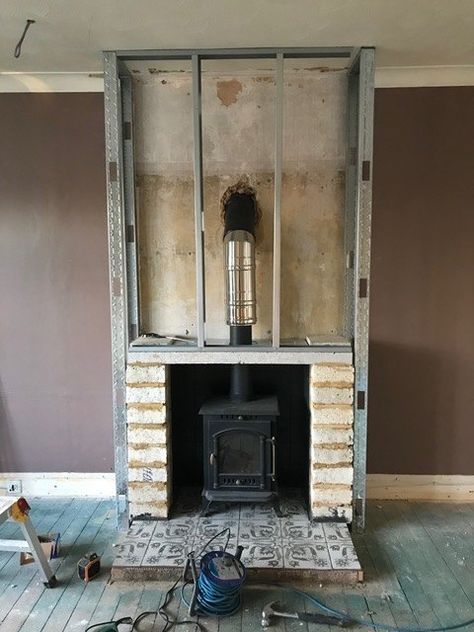 We bought a 1920s house that sadly was devoid of many of the original features it would have had. We have been on a mission ever since to return some of those features back to the house.No longer having chimney breasts or chimneys, a log burner was the easiest way for us. However, we wanted a traditional looking fireplace. We decided to create a fake chimney breast to create the look. We had to ensure we met all fire regulations so we took advice to ensure we were doing everything safe… Wood Burning Stove No Chimney, Fireplace No Chimney Breast, Log Burner No Chimney, Living Room To Sunroom Transition, Log Burner No Chimney Breast, Log Burner Living Room No Fireplace, Fake Chimney Breast, Fake Chimney Living Rooms, Log Burner Fireplace Ideas