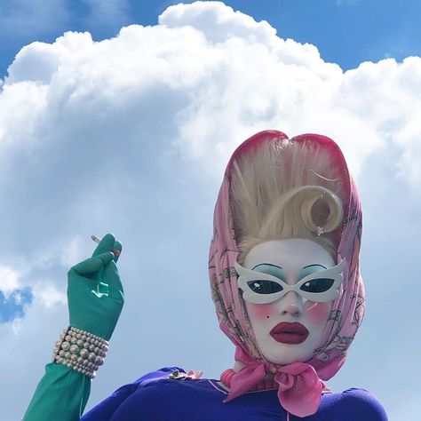 Juno Birch on Instagram: “Just waiting for my Uber 🛸☁️” Juno Birch, Juno, A Woman, Mask, Hair, Pink, On Instagram, Blue, White