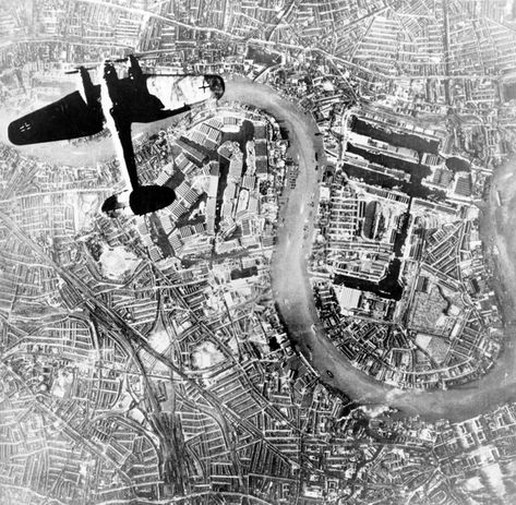 A Heinkel He 111 bomber flying over London's docks London Blitz, Isle Of Dogs, London History, The Blitz, Battle Of Britain, Old London, Aerial Photo, British History, Coventry