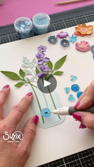 27K views · 2.3K reactions | My crafty vibes are back & who remembers the nostalgic past time favorite of Shrinky Dink crafting?!As a kid, they were one of my favorites to get the creative ideas going & @sizzix certainly has brought this amazing craft back to life in their shrink plastic!👏🏼

I used these beautiful plastic shapes that I made from the @sizzix Thinlits - “Fabulous Everyday Shapes” & Framelits - “Circle Frames” to add to my flower jar vase, then used it to to create my spring time greeting card. The handy gotcha magnetic craft stand tool, designed by Stacey Park was extremely helpful in keeping my dies organized while I worked! Also, the gorgeous defined petals 3-D Textured Impressions embossing folder, from the @sizzix Spring Collection made the perfect back drop for my flo Craft Stand, Altered Cards, Flower Jar, Flowers In Jars, Shrinky Dink, Back Drop, Jar Vase, Shrink Plastic, Circle Frames