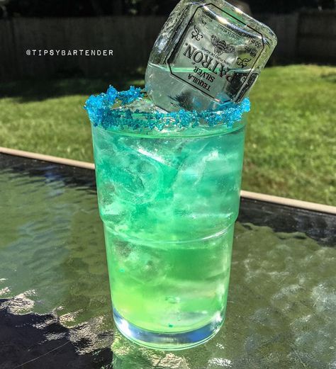 Patron Dew Cocktail - For more delicious recipes and drinks, visit us here: www.TopShelfPours.com Island Punch Pucker, Mini Patron Bottles, Patron Drinks, Patron Bottle, Mix Drinks, Tipsy Bartender, Mountain Dew, Drinks Alcohol Recipes, Alcohol Recipes