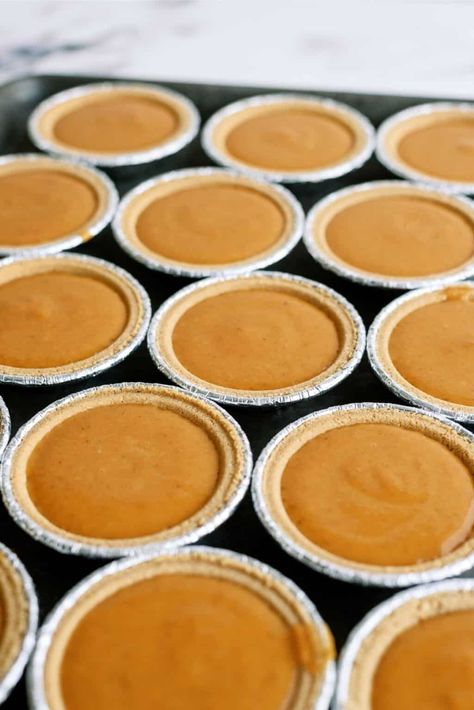 Mini Pumpkin Pies Recipe - Six Sisters' Stuff How To Make Mini Pumpkin Pies, Pumpkin Pie Recipe Mini, Pumpkin Pie Mini Pies, Mini Pumpkin Pies In A Muffin Tin, Pumpkin Pie Recipe Graham Cracker Crust, Turtle Meat Recipe, Mini Sweet Potato Pie, Grahm Cracker Crust, Individual Pumpkin Pie