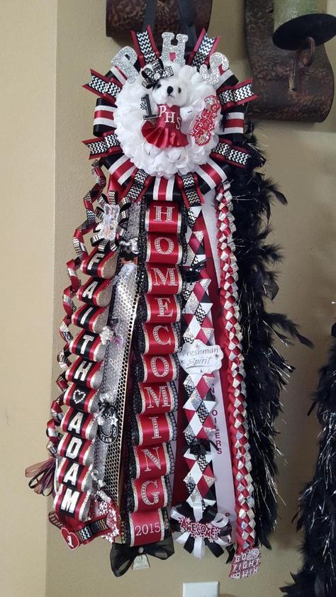 Maroon, black, silver, and white!! “Not Your Average Mum” handcrafted by Amanda Morse!! Maroon Black And White Homecoming Mum, Homecoming Mum Junior Ideas, Red Black White Homecoming Mums, Maroon And White Homecoming Mums, Red And Black Mums Homecoming, Red Black And White Homecoming Mums, Red Mums Homecoming, Maroon Homecoming Mums, Maroon And White Mums Homecoming