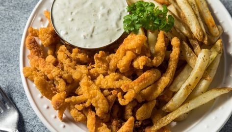 Looking for new and exciting ways to cook with clam strips? Check out these 8+ delicious recipes that will satisfy your seafood cravings. From classic clam chowder to crispy fried clam strips, these dishes are sure to impress. Whether you're a seafood lover or just looking to switch up your dinner routine, these recipes are easy to make and packed with flavor. Pin now and try them out later! #clamstrips #seafoodrecipes #cookingtips #foodie #yum Clam Strips Recipe, Fried Clams, Spicy Cocktail, Quick And Easy Meals, Teriyaki Glaze, Dinner Delicious, Creative Recipes, Simple Green Salad, Clam Bake