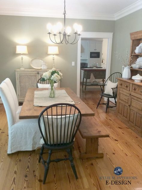 Benjamin Moore Nantucket Gray shown in a farmhouse country style dining room with rustic pine wood flooring and oak furniture. Nantucket Gray is a green gray paint colour. Kylie M Interiors Edesign. #farmhousediningroom #greenpaint #farmousestyle Benjamin Moore Nantucket Gray, Benjamin Moore Green Paint, Green Dining Room Paint, Rustic Living Room Colors, Green Paint Colours, Nantucket Gray, Benjamin Moore Green, Nantucket Aesthetic, Dining Room Wall Color