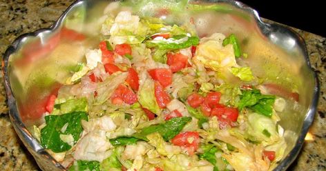 It may sound silly, but one of my favorite dishes to eat when I eat Ethiopian food is this tomato salad.  Truth be told, even though Ethiopi... Ethiopian Salad, Salsa Salad, Ethiopian Cuisine, Ethiopian Food, Truth Be Told, Large Salad Bowl, Roma Tomatoes, Tomato Salad, Vegan Cooking