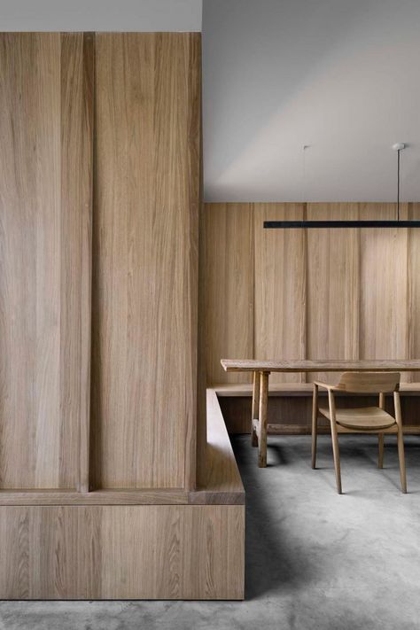 The dark, patinated concrete contrasts with extensive wall panelling and joinery in oak that introduces a softer, natural tone and finish to the interior. Brick Extension, Interlocking Bricks, Design Blogs, London House, White Ceiling, Wood Interiors, Industrial Lighting, Lighting Ideas, Design Living