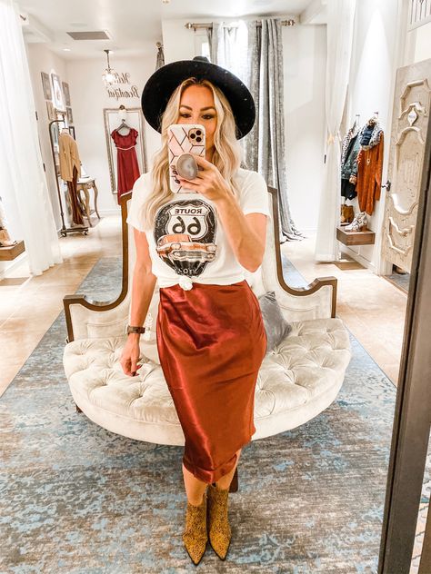 Loving this slip and T-shirt combo. Rust silk slip dress and knotted T-shirt. Rust Slip Dress, Silk Dress T Shirt Outfit, Silk Dress With Tshirt Outfit, Slip Dress Western Outfit, Satin Dress And T Shirt, Slip Skirt T Shirt Outfit, Tshirt And Slip Dress, Western Slip Dress Outfit, Rust Silk Skirt Outfit