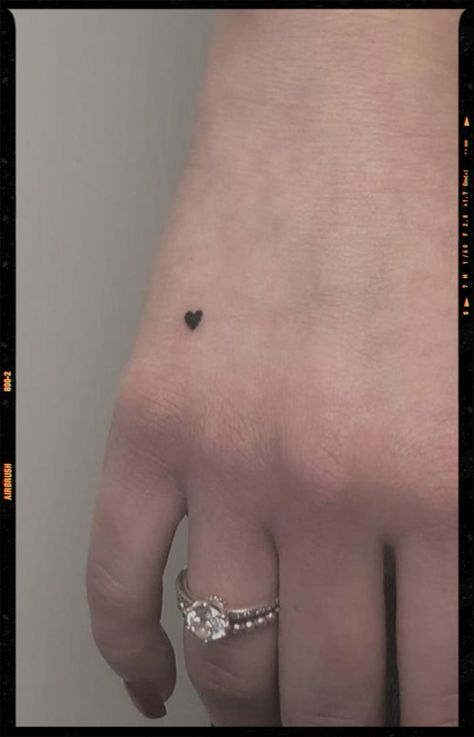 small heart tattoo Small Brown Heart Tattoo, Heart Hand Tattoos For Women, Small Heart Tattoo, Hart Tattoo, Little Heart Tattoos, Black Heart Tattoos, Love Heart Tattoo, Tiny Tats, Small Heart Tattoos