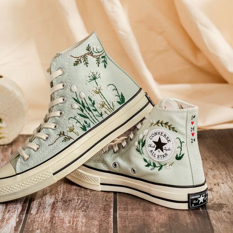 Customized Embroidered Converse High Tops, Flower Embroidered Sneakers for Women, Personalized Converse, Wedding Sneakers for Bride, Handmade Gift 💚 Immerse yourself in the intricate craftsmanship as we lovingly hand embroider rustic flowers onto your chosen Converse pair 💚 🌿 The listed price encompasses both the Converse Shoes and the showcased Embroidery Designs. 1. MANUFACTURING PROCEDURE 🌿 Upon receiving your order, we initiate the shoe preparation process. If your chosen shoes are readi Embroidered High Tops, Converse Stitching, Converse Flower Embroidery, Light Green Converse, Embroidered Converse High Tops, Wedding Sneakers For Bride, Personalized Converse, Sneakers Wedding, Converse Chuck 70s