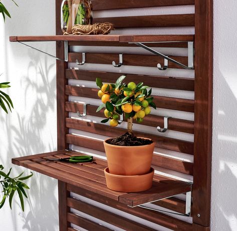 2020 - Although the outdoors can be messy, the Äpplarö Wall Panel With Shelves ($69) can easily clean up any backyard space. Ikea Applaro, Galvanized Shelves, Christmas Balcony, Lights Balcony, Luxury Balcony, Outdoor Shelves, Apartment Privacy, Balcony Privacy, Outdoor Storage Bench