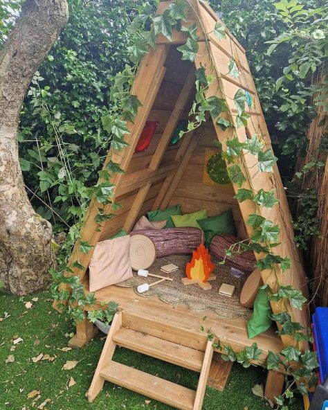 Cosy Direct | Can we spend our Monday in here? 😍💚 Our Forest Fern featuring in this fabulous setting Repost from @the_ark_childcare • The forest fern… | Instagram Forest School Fire Pit, Woods Play Area, Daycare Yard Ideas, Whimsical Yard Ideas, Forest Hangout Spot, Forest Playhouse, Diy Clubhouse Outdoor Kids, Forest Dramatic Play, Kid Backyard Ideas