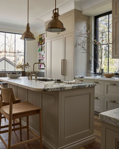 A panelled fridge not only blends seamlessly with your cabinetry for a polished look but also allows for improved insulation and energy efficiency. By integrating the appliance into the kitchen design, you maintain a cohesive aesthetic while benefiting from enhanced temperature control and reduced energy consumption.

Design: Black Sheep Interior Design
Décor: Clarisa Llaneza
Build: Ratcliffe and Black
Photo: Lauren Miller
Styling: Stacey Smithers Traditional Modern Kitchen, Heritage Kitchen, Brick Mansion, Lauren Miller, Marble Trend, Marble Countertops Kitchen, Neutral Kitchen, Custom Coffee Table, Black Photo