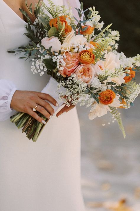 Cream Fall Wedding, Terracotta Peony Bouquet, Bridal Bouquet Pop Of Color, Soft Color Wedding Bouquet, Fall Outdoor Wedding Flowers, Light Blue And Orange Wedding Bouquet, Fall Floral Wedding Bouquets, Peach And Orange Bouquet, White And Orange Wedding Bouquet