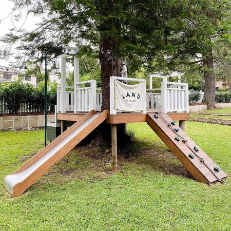 Journey Home | All angles of the tree platform 👀...with all the rain this summer it’s surrounded by 50 shades of green! 🌲🪴🌱🍃 | Instagram Play Area Around Tree, Deck Built Around Tree, Tree House Around Tree, Nature Playground Backyard, Tree Platform For Kids, Platform Treehouse For Kids, Diy Tree House For Kids, Playground Design Landscape, Backyard Tree House