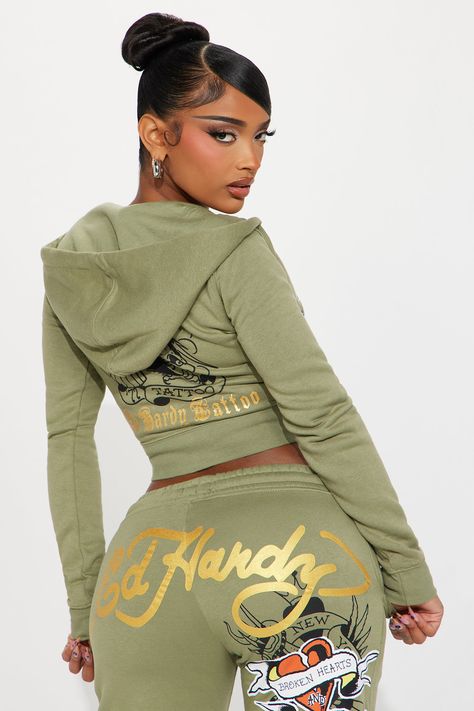 Available In Sage. Hoodie Front Zip Long Sleeve Front And Back Screen Ed Hardy Graphic Stretch Pair To "Ed Hardy Broken Hearts Pant" Disclaimer: Due To The Printing Process A Difference In Saturation May Occur. Each Garment Is Unique. 55% Cotton 45% Polyester Imported | Ed Hardy Broken Hearts Zip Front Hoodie in Sage size Small by Fashion Nova Cute Swag Outfits For Women, Ed Hardy Sweatsuit, Trapstar Jacket Women, Japanese Streetwear Women Tokyo Fashion, Ed Hardy Set, Ed Hardy Tracksuit, Women’s Streetwear, Baddie Must Haves, Casual Baddie Fits