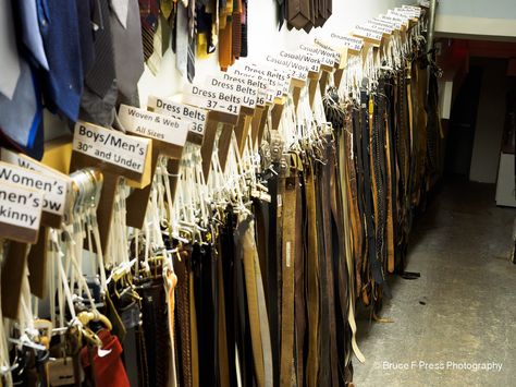 Belt storage. Belts arranged by size and hung on rings. Much more efficient than stuffing them in a bin. Retail Belt Display Ideas, Tutu Storage, Theater Costume Storage Ideas, Costume Room Theatre, Belts Display Retail, Theater Organization, Theatre Costume Organization, Theatre Storage, Costume Organization