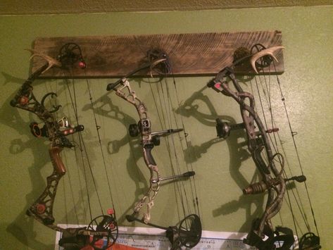 Bow holder I made out of cypress wood. Hanging Bow And Arrow On Wall, Hunting Bow Holder Diy, Pallet Bow Rack, Hunting Bow Storage Ideas, Bow Hanger Archery, Bow And Arrow Holder Diy, Bow And Arrow Rack, Compound Bow Holder Diy, Diy Compound Bow Holder