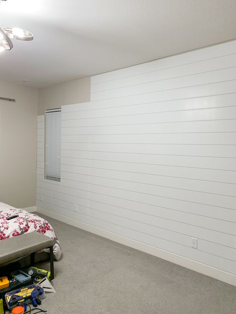 Your Guide on How to Easily Install Horizontal Shiplap - Neatly Living Long Shiplap Wall, How To Hang Shiplap Wall, Shiplap Paneling Sheets Living Room, Horizontal Paneling Walls, Horizontal And Vertical Shiplap On Same Wall, Horizontal Shiplap Wall Bedroom, Large Shiplap Wall, White Accent Wall Bedroom, Shiplap Around Windows