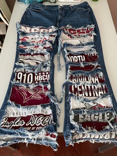 pants made by me. IG: _younghotebony_ 🖤DM ME ON THERE FOR ORDERS #nccu #hbcugrad #hbcuhomecoming #graduationoutfitideas #customjeans Tapestry Outfit Ideas, Senior Heads, Hoco Pants, College Pants, Senior Pants, Diy Distressed Jeans, College Gameday Outfits, Fashion Design Classes, Senior Stuff