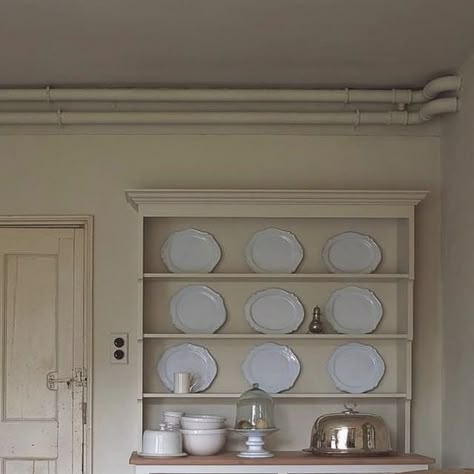 Hayley @purenourishment on Instagram: "Breathtakingly beautiful, a @plainenglishdesign dresser added to complement original Georgian cabinetry in this gorgeous cream kitchen. There is something so wholesome and comforting about this space, the cream paintwork and the wooden furniture, with the quarry tiled floor and the exposed pipes; so unpretentious yet beautifully stylish, classic and timeless. I think the proportions are perfect, the room has its own story, not just a history, and I wonder about the many kitchen table conversations it’s witnessed.. 🤍 oh and the scratches on the bottom of the door even feel familiar, except with three big dogs, my door bears scratches that are considerably higher! 🙈🐾😬 #goodjobilovethem Image reposted via @plainenglishdesign #kitchen #kitchendesign # Georgian Kitchen, Tiled Floor, Cream Kitchen, Plain English, Welsh Dresser, Kitchen Dresser, The Quarry, English Kitchens, English Design