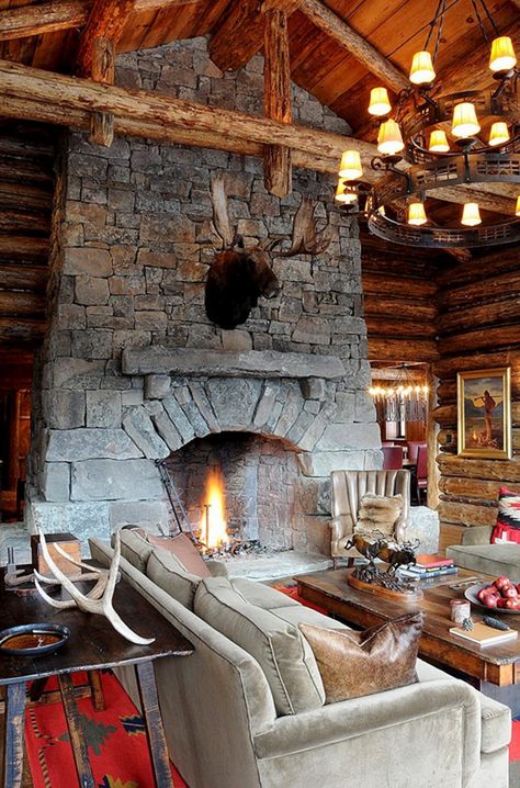 Cozy ski lodge retreat boasting rustic elegance in Big Sky Ski Lodge Living Room, Ski Lodge Fireplace, Rustic Ski Lodge, Lodge Fireplace, Cozy Ski Lodge, Lodge Living Room, Lodge Aesthetic, Winter Lodge, Cabin Fireplace