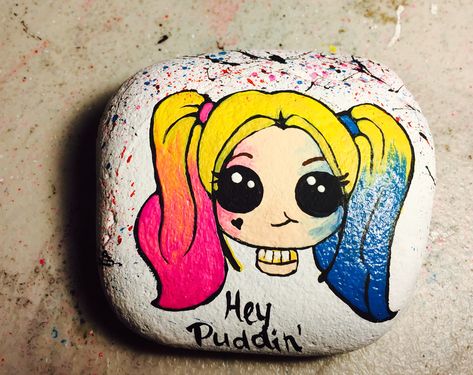 Harley Quinn rock painting Alice In Wonderland Rock Painting, Monster Inc Rock Painting, Princess Rock Painting, Barbie Painted Rocks, Character Painted Rocks, Best Kids Watches, Diy Rock Art, Stone Art Painting, Painted Shells