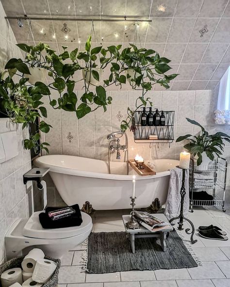 Hausera on Instagram: “Giant bathtub. Hanging plants. Candles. This bathroom has it all. 💚⠀ ⠀ Photo | @kunis_lovely_vintage_home” Bohemian Bathroom, Bathtub Decor, Budget Home Decorating, Bathroom Plants, Guest Bathrooms, House Plants Decor, Online Furniture Shopping, Elegant Home Decor, Discount Furniture