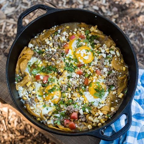 Camping Chilaquiles Recipe Camping Breakfast Recipes, Fire Pit Food, Easy Camping Breakfast, Dutch Oven Camping Recipes, Chilaquiles Recipe, Camping Food List, Camp Meals, Camping Hacks Food, Best Dutch Oven