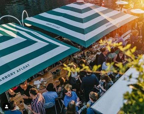 Heavy duty striped umbrellas making a statement at Arbory Afloat! Arbory Afloat, Cafe Umbrella, European Cafe, Outdoor Entertaining Area, Modern City, Outdoor Entertaining, Amazon Prime, Melbourne, Ram