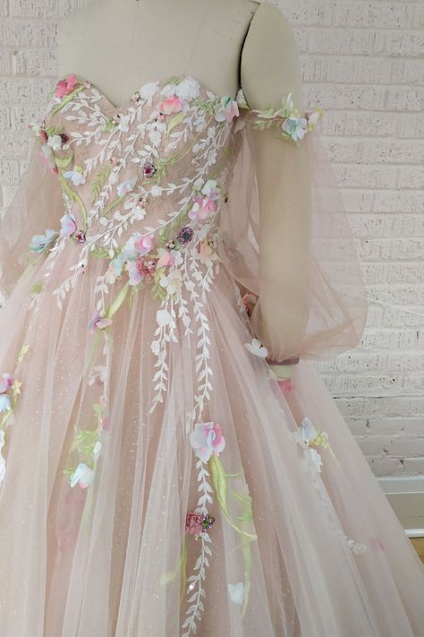 A dreamy wedding dress could be ideal for your wedding day. Our team love this gown for a fairy tale wedding. Collect this inspiration to your dream gown collection. Fairy Themed Wedding Dress, Pink Sleeveless Fairy Dress For Wedding, Pink Whimsical Fairy Dress For Spring, Luxury Pink Fairy Dress For Wedding, Pastel Pink Wedding Dress, Fairy Core Wedding Dress, Fairy Princess Wedding Dress, Fairy Wedding Dresses, Pink Fairycore Wedding Dress