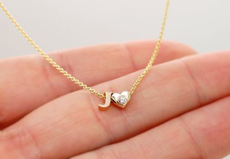 This solid gold letter J initial necklace. Letters are small, please swipe for the pictures for size reference. Could be made in 14K yellow, white and rose gold. If you are looking for a charm necklace, here: https://www.etsy.com/listing/534422198/14k-gold-letter-necklace-tiny-initial Charm bracelet: https://www.etsy.com/listing/465584610/add-on-initial-bracelet-14k-gold-letter All letters, a heart and a star are available, just write down which ones you need in the comment section of the order. Letter J Necklace Initials, A Initial Jewelry, J Necklace Initial, J Letter Necklace, J Bracelet, J Name, J Initial Necklace, Letter J Necklace, J Ring