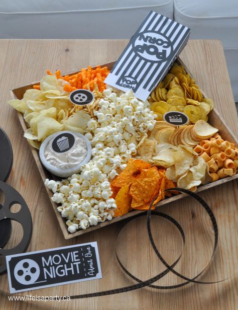 Movie Date Night At Home: take it to the next level with a #cricutmade #ad movie ticket, movie bunting, food pics, popcorn box, and movie genre dice Home Movie Night Snacks, Movie Date Night At Home Snacks, Guys Night Food, Date Night Snacks At Home, Movie Snacks Ideas, Movie Night Snacks Aesthetic, Food For Movie Night, Movie Night Snacks Healthy, Movie Food Ideas