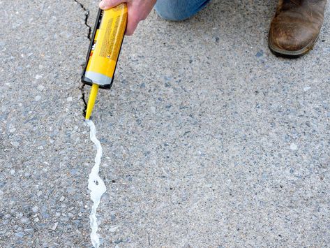 The 12 Best Concrete Crack Fillers of 2024, Tested and Reviewed How To Repair Cracked Concrete Driveway, How To Fix Cracked Concrete, Fix Cracked Concrete, Repair Concrete Driveway, Concrete Filler, Repair Cracked Concrete, Driveway Resurfacing, Concrete Sealant, Cracked Concrete