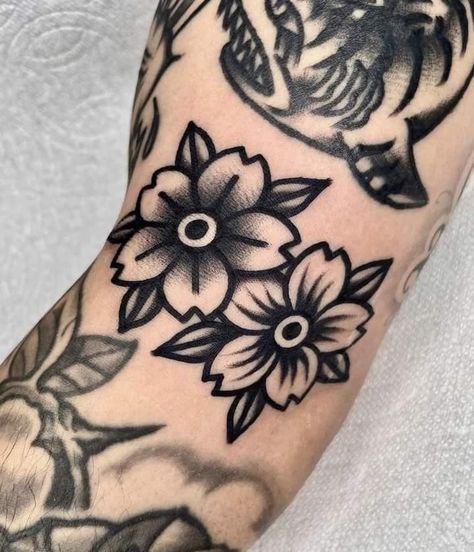 American Traditional Wrist Band Tattoo, Trad Wrist Tattoo, Traditional Style Floral Tattoo, American Trad Flower Tattoo, Traditional Tattoo Flowers Black, Black Work Traditional Tattoo, American Trad Flower, Old School Flower Tattoo, American Traditional Flowers