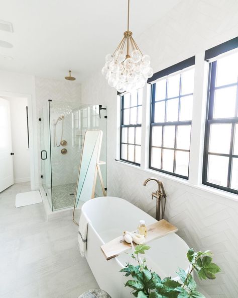 Lamps.com on Instagram: “Add a chandelier to your bathroom for a luxury, spa-like experience on the daily 🤩🌿⁠⁠” Light Over Bathtub, Light Over Tub, Chandelier Over Bathtub, Bathroom Chandelier Lighting, Chandelier Over Tub, Tub Chandelier, Bathtub Lighting, Tub Lighting, Bathroom Chandelier