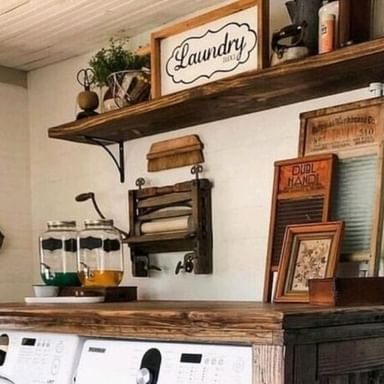 Farmhouse Is My Style on Instagram: "Transforming chores into a delightful experience with this rustic farmhouse laundry room! 🧺✨ The warm wood accents and vintage decor give this space a cozy, inviting vibe. The brick herringbone floor adds a touch of classic charm, while the practical shelving keeps everything organized and within reach. This setup makes laundry day something to look forward to! 🧼🌿 (Photo Credit: @flatwoodsfarmhouse)  #FarmhouseLaundry #RusticCharm #LaundryRoomGoals #VintageDecor #HomeOrganization" Cottage Laundry Room Decor, Vintage Style Laundry Room, Rustic Laundry Room Ideas, Laundry Room Rustic, Rustic Farmhouse Laundry Room, Brick Herringbone Floor, Primitive Laundry Rooms, Brick Herringbone, Rustic Laundry Room